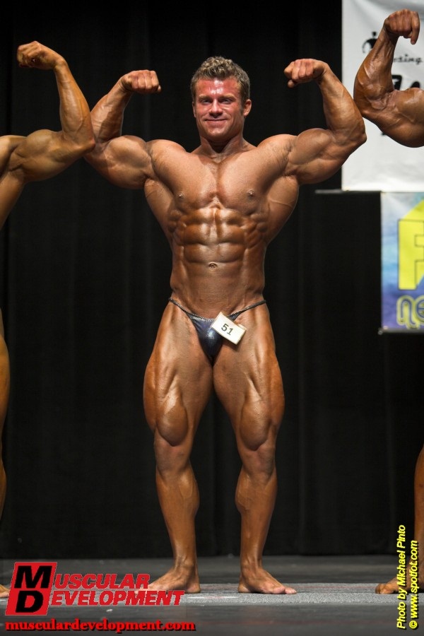 Bodybuilders Shows His Front Pose on Stage Editorial Photo - Image of  editorial, flexing: 62179781